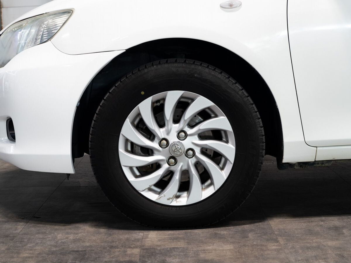 Toyota Corolla Axio 2010 - фото автомобиля
