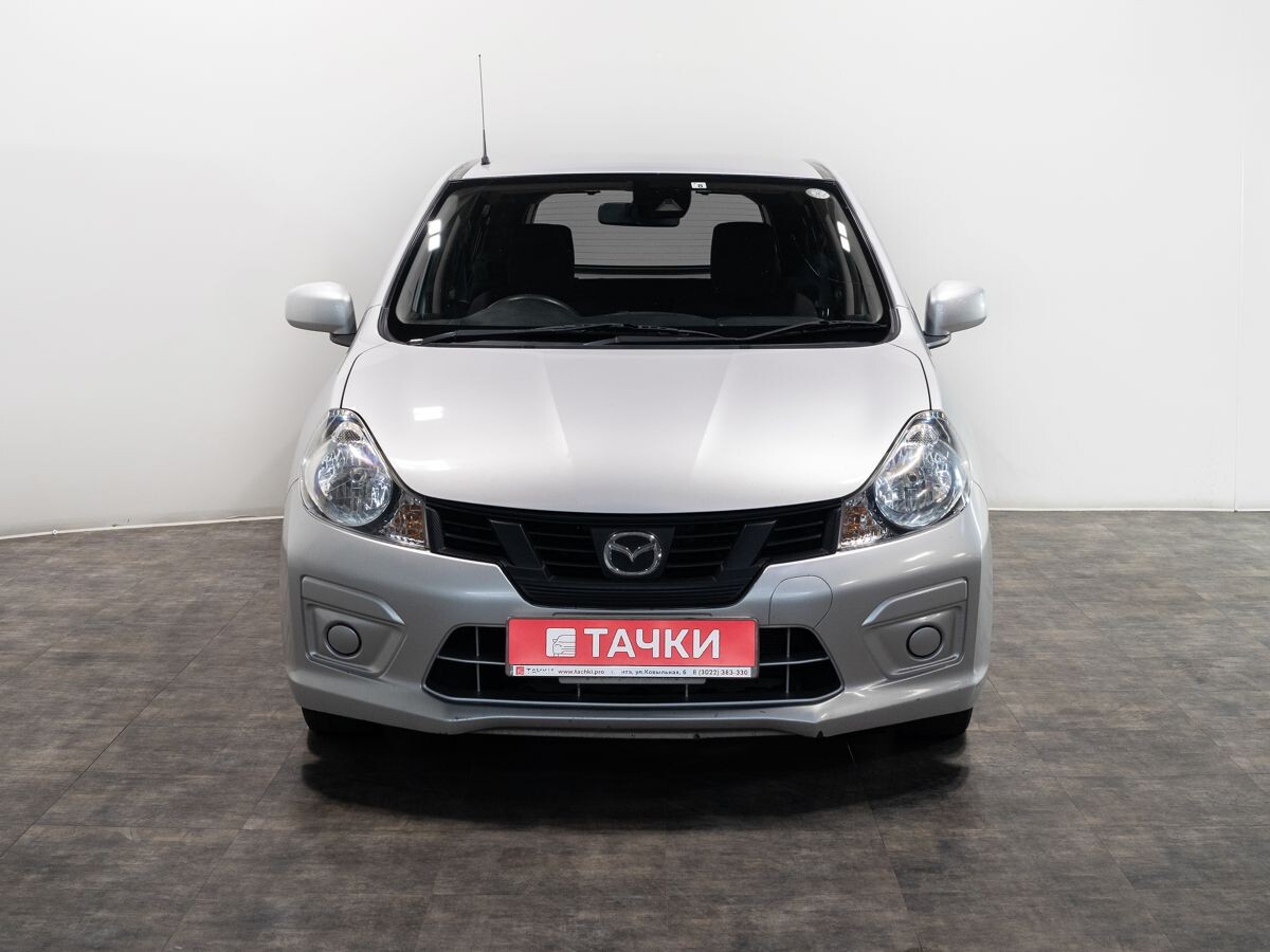 Mazda Familia 2017 - фото автомобиля
