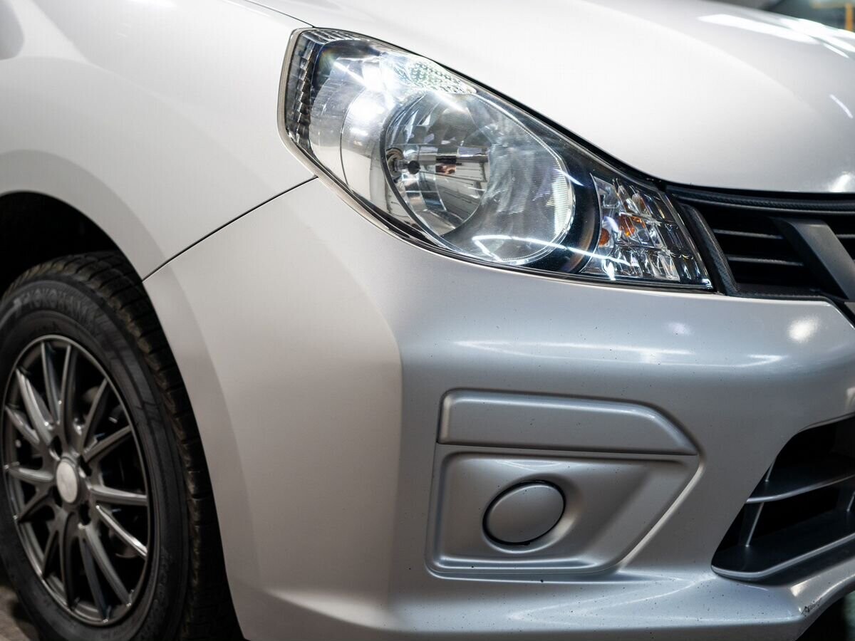Mazda Familia 2017 - фото автомобиля