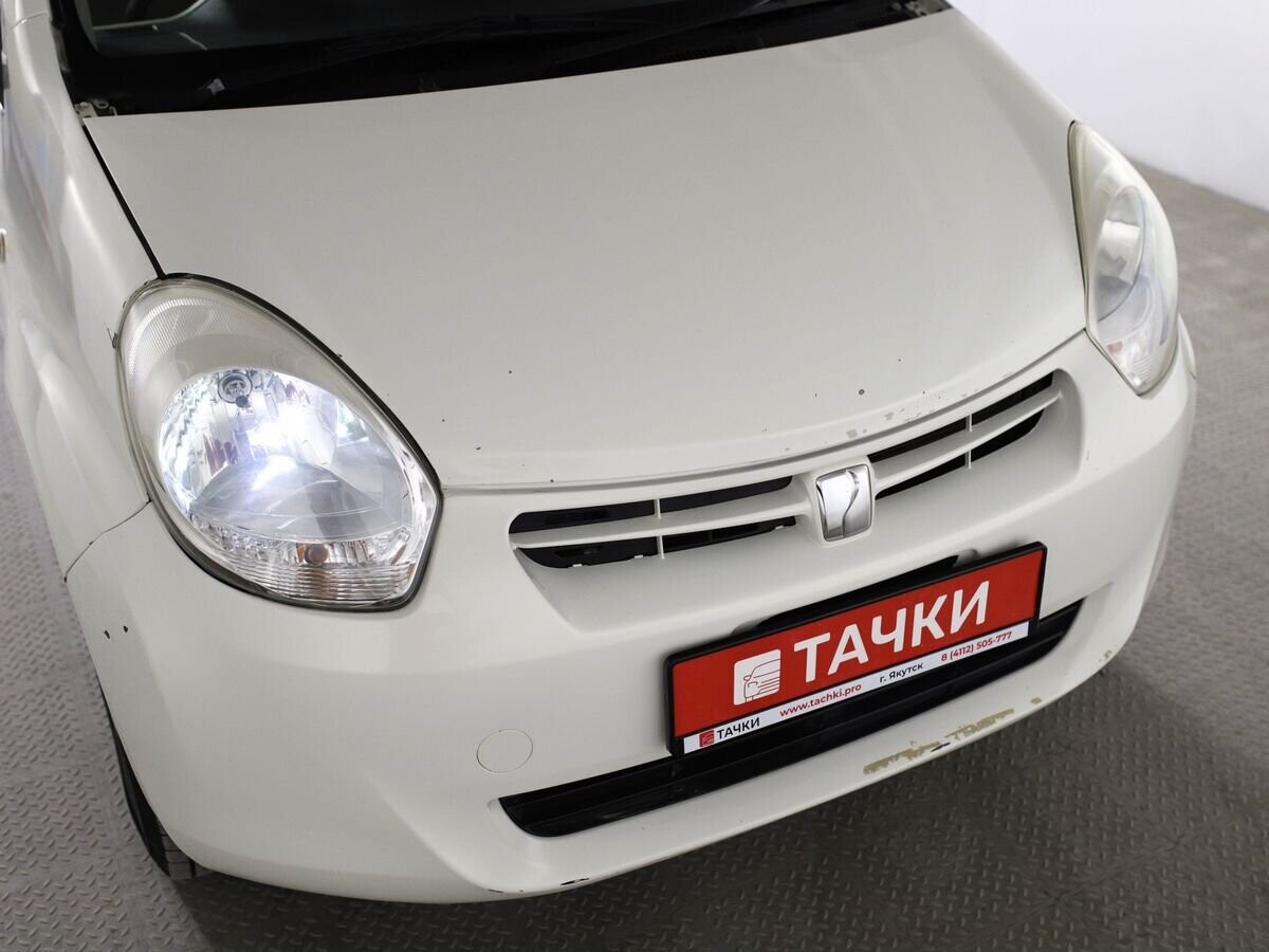 Toyota Passo 2011 - фото автомобиля