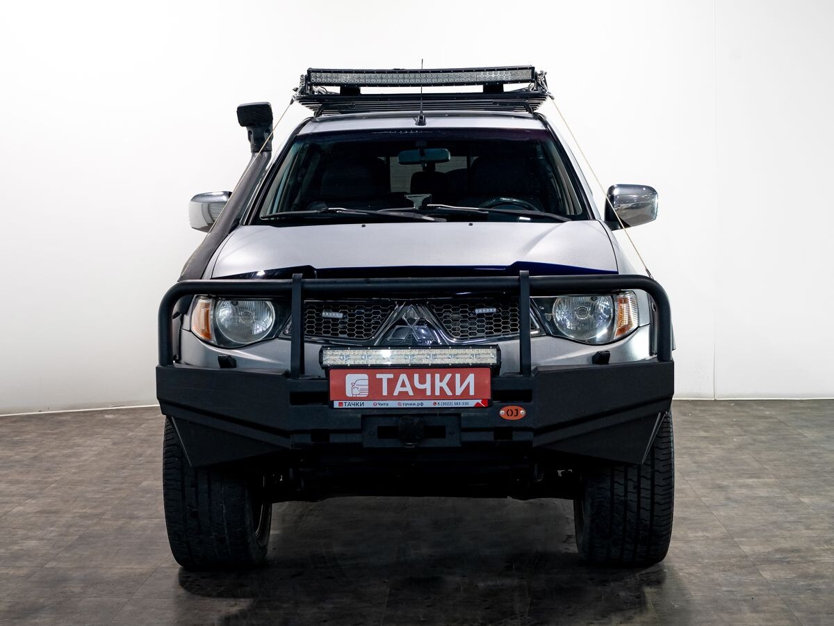 Mitsubishi L200 2008 - фото автомобиля