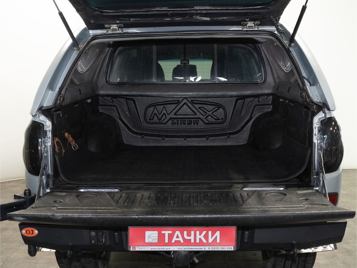 Mitsubishi L200 2008 - фото автомобиля