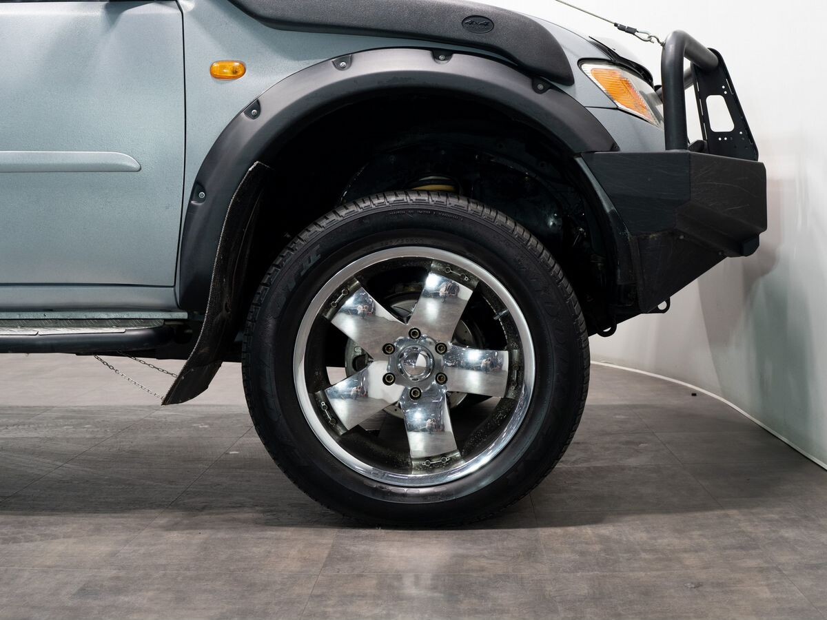 Mitsubishi L200 2008 - фото автомобиля