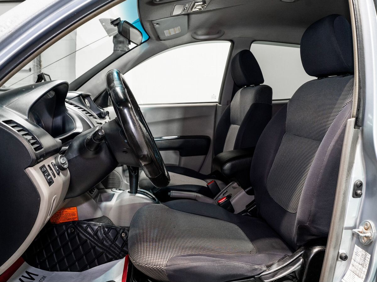 Mitsubishi L200 2008 - фото автомобиля