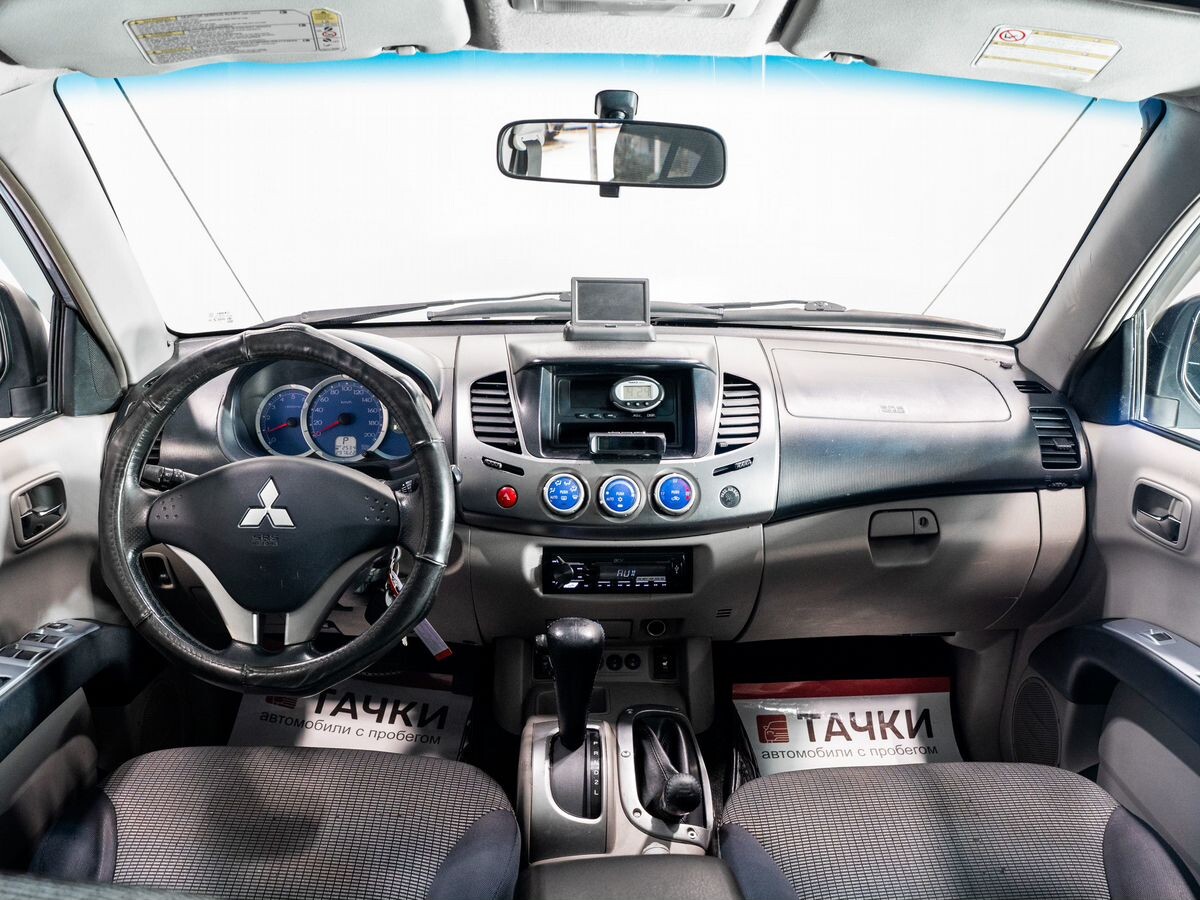 Mitsubishi L200 2008 - фото автомобиля
