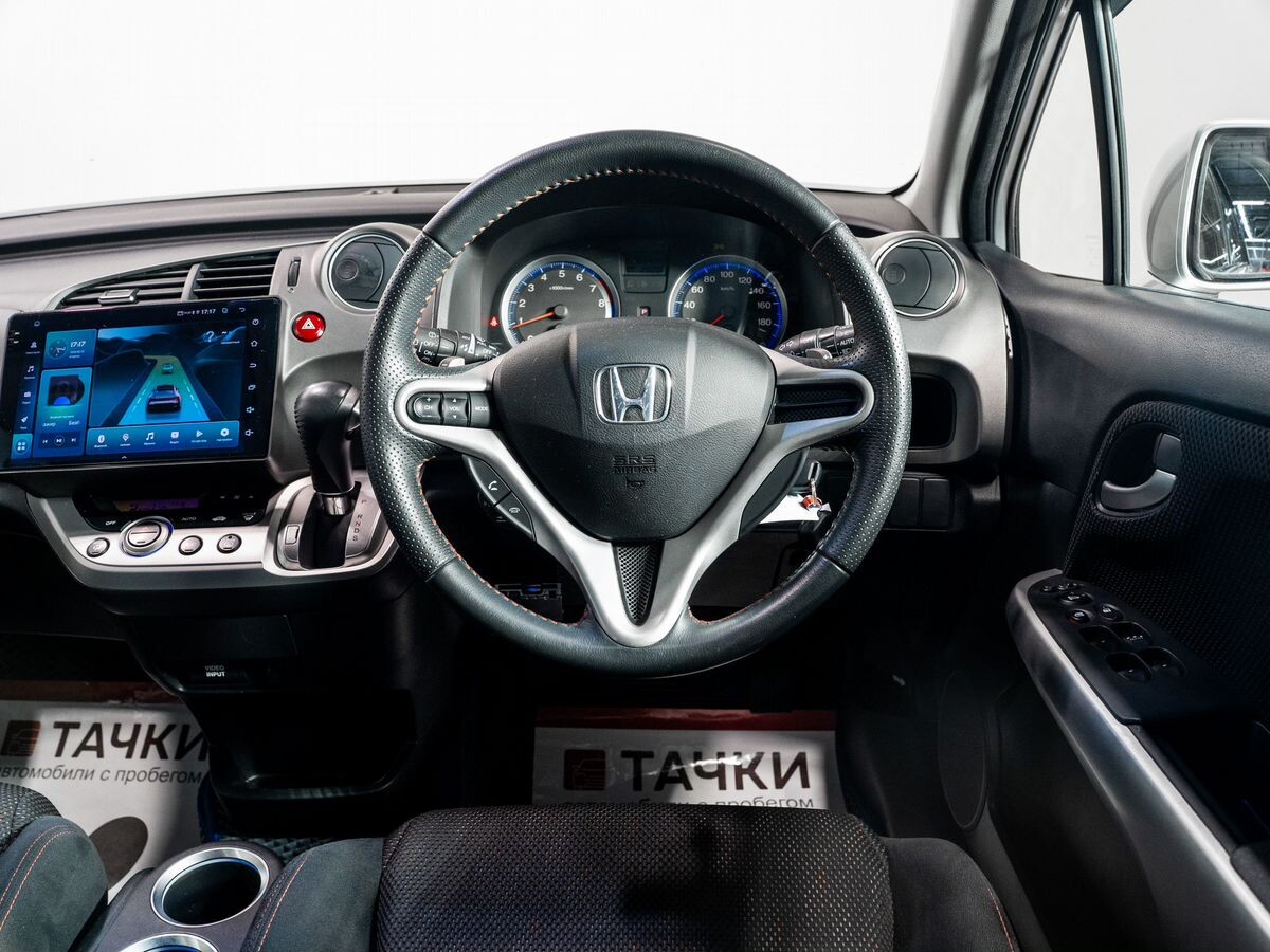 Honda Stream 2009 - фото автомобиля