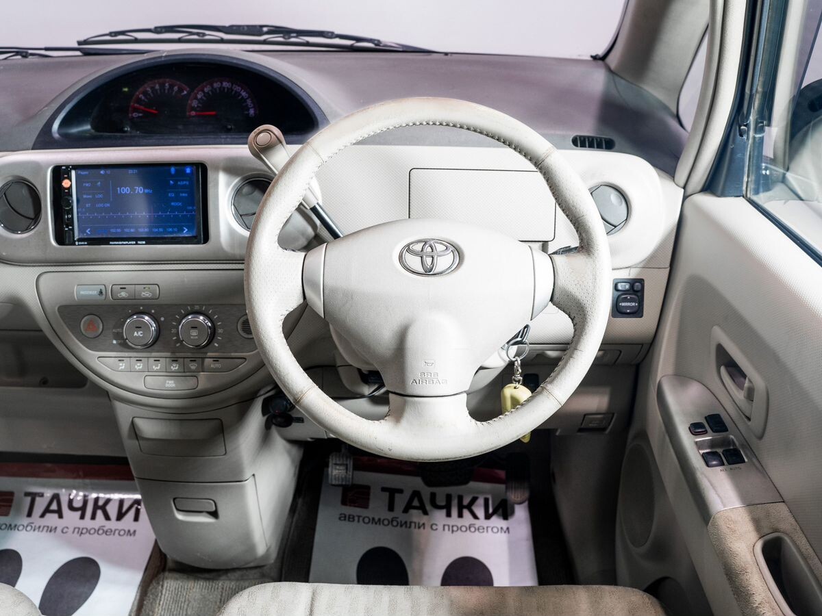 Toyota Porte 2008 - фото автомобиля