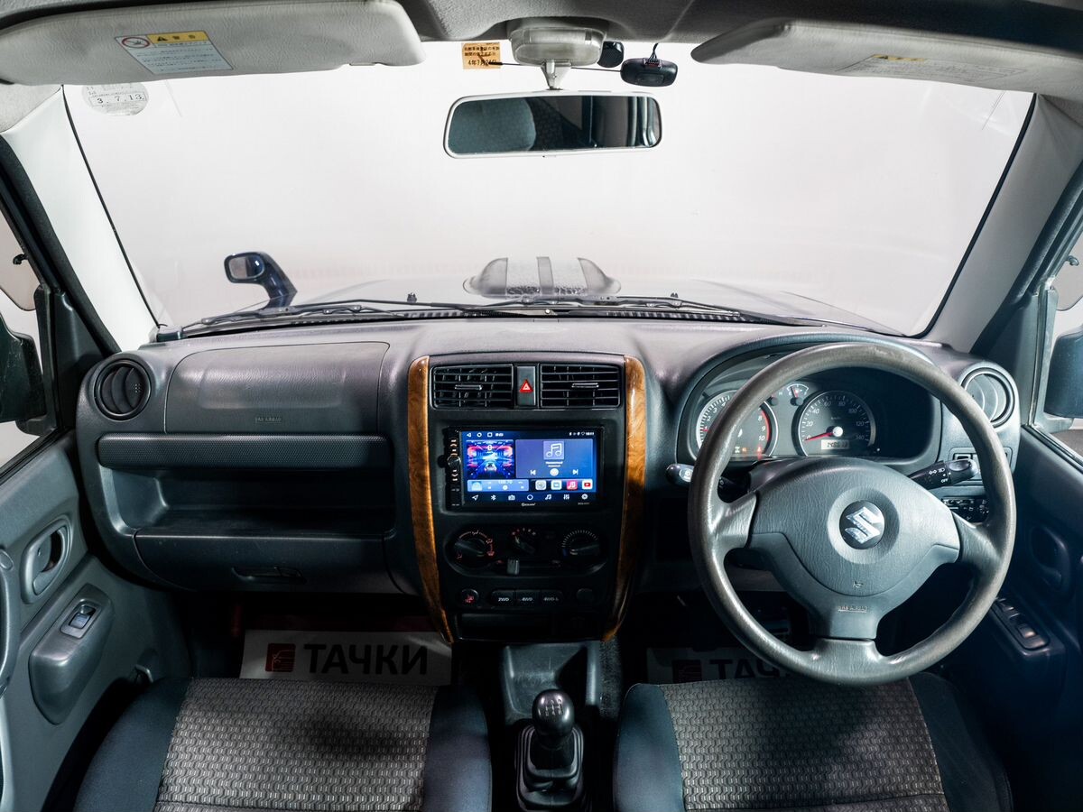 Suzuki Jimny 2011 - фото автомобиля