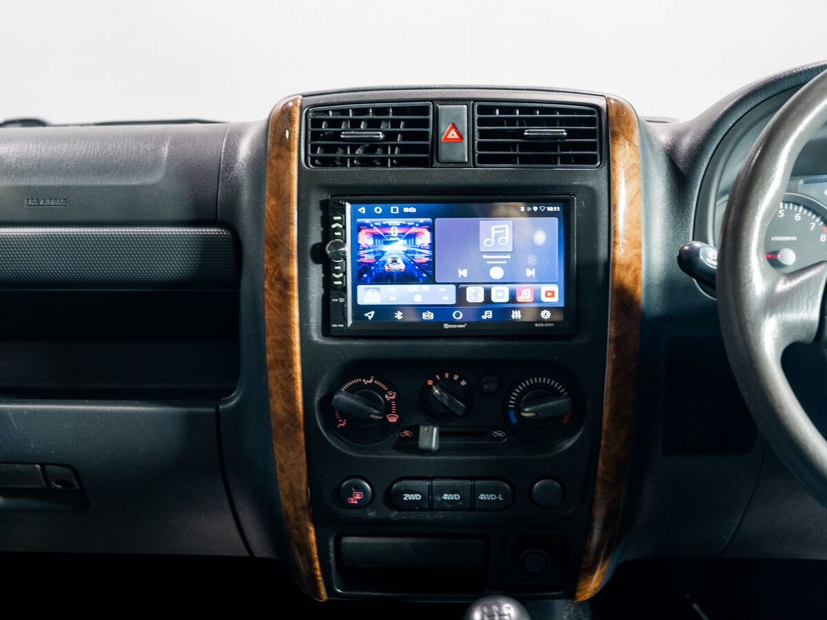 Suzuki Jimny 2011 - фото автомобиля