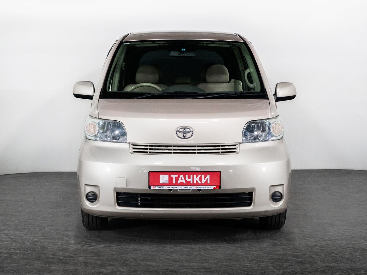 Toyota Porte 2011 - фото автомобиля