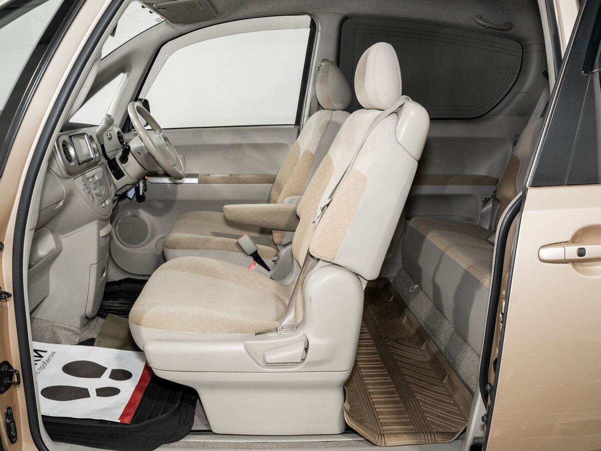 Toyota Porte 2011 - фото автомобиля
