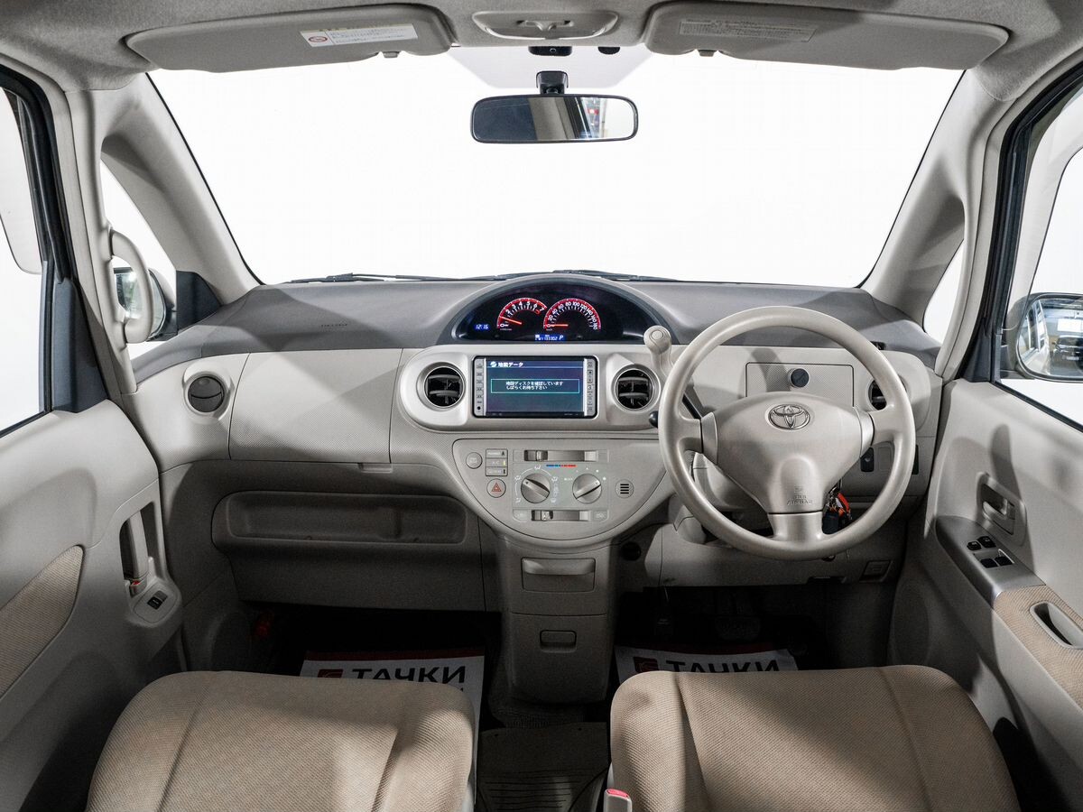 Toyota Porte 2011 - фото автомобиля