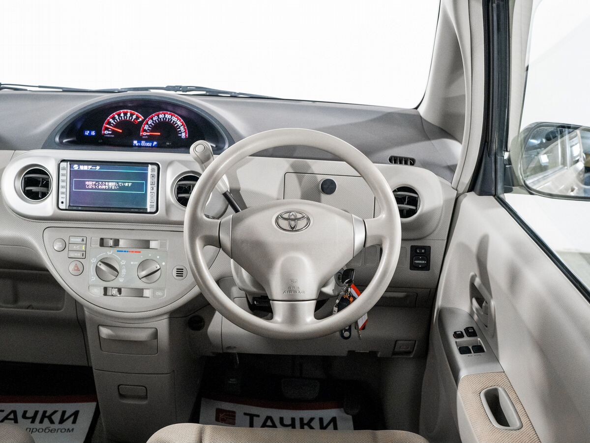 Toyota Porte 2011 - фото автомобиля