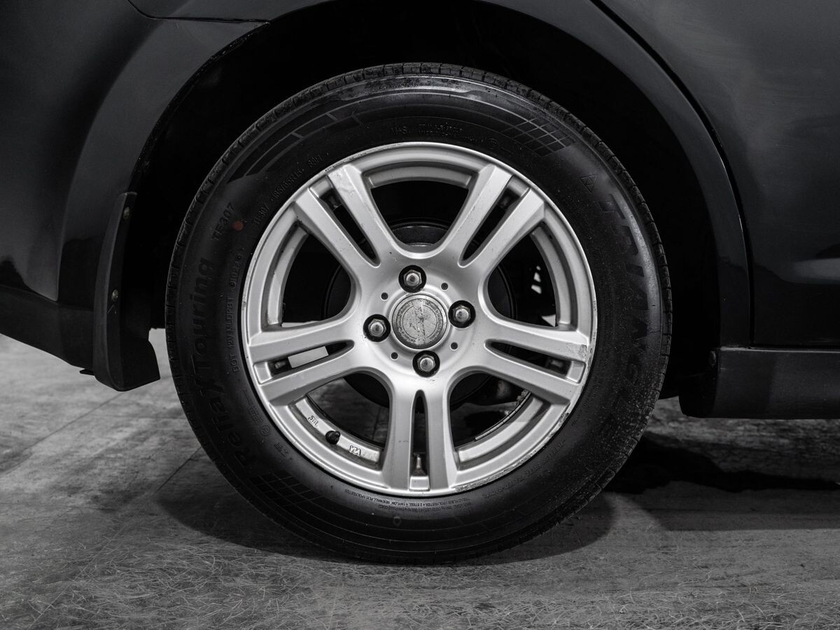 Nissan Tiida 2009 - фото автомобиля