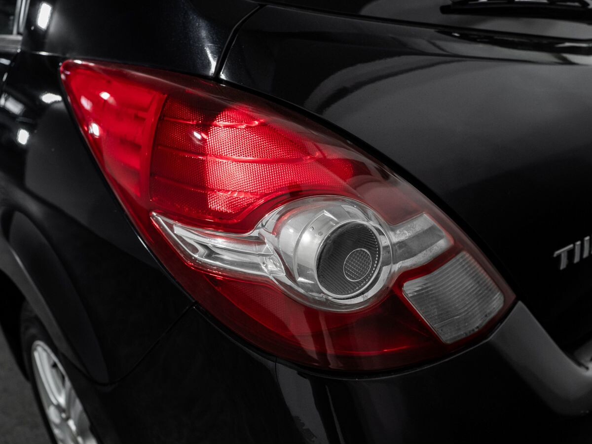 Nissan Tiida 2009 - фото автомобиля
