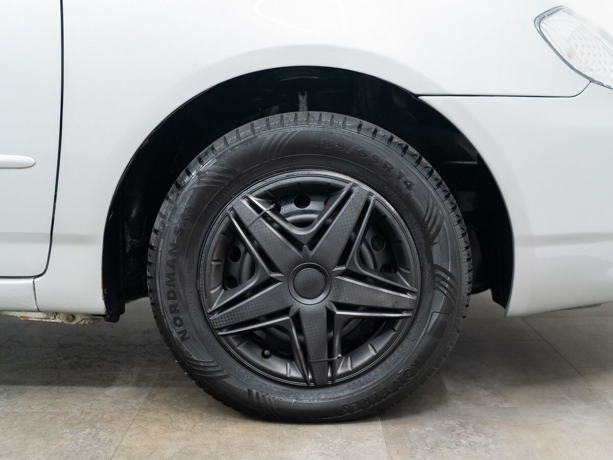 Toyota Corolla Runx 2002 - фото автомобиля