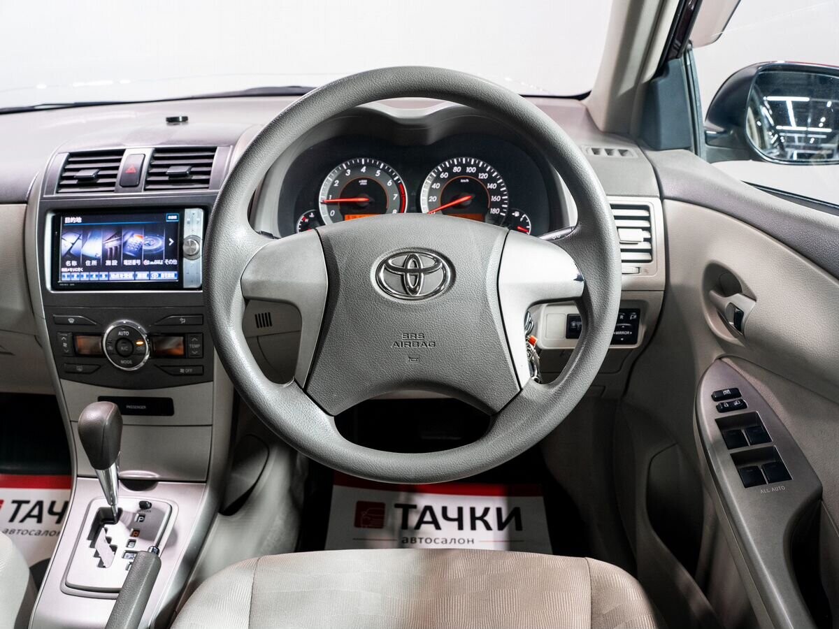 Toyota Corolla Axio 2009 - фото автомобиля