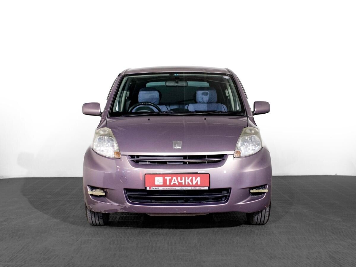 Toyota Passo 2009 - фото автомобиля