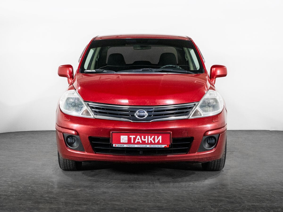 Nissan Tiida 2010 - фото автомобиля