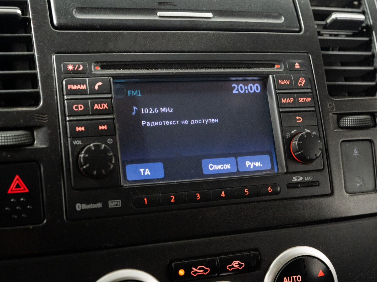Nissan Tiida 2010 - фото автомобиля