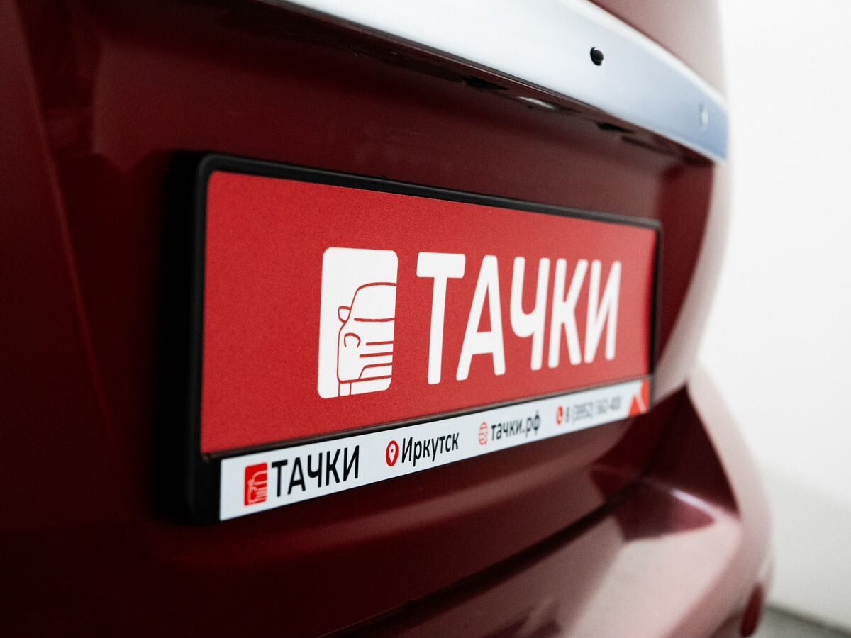 Nissan Tiida 2010 - фото автомобиля