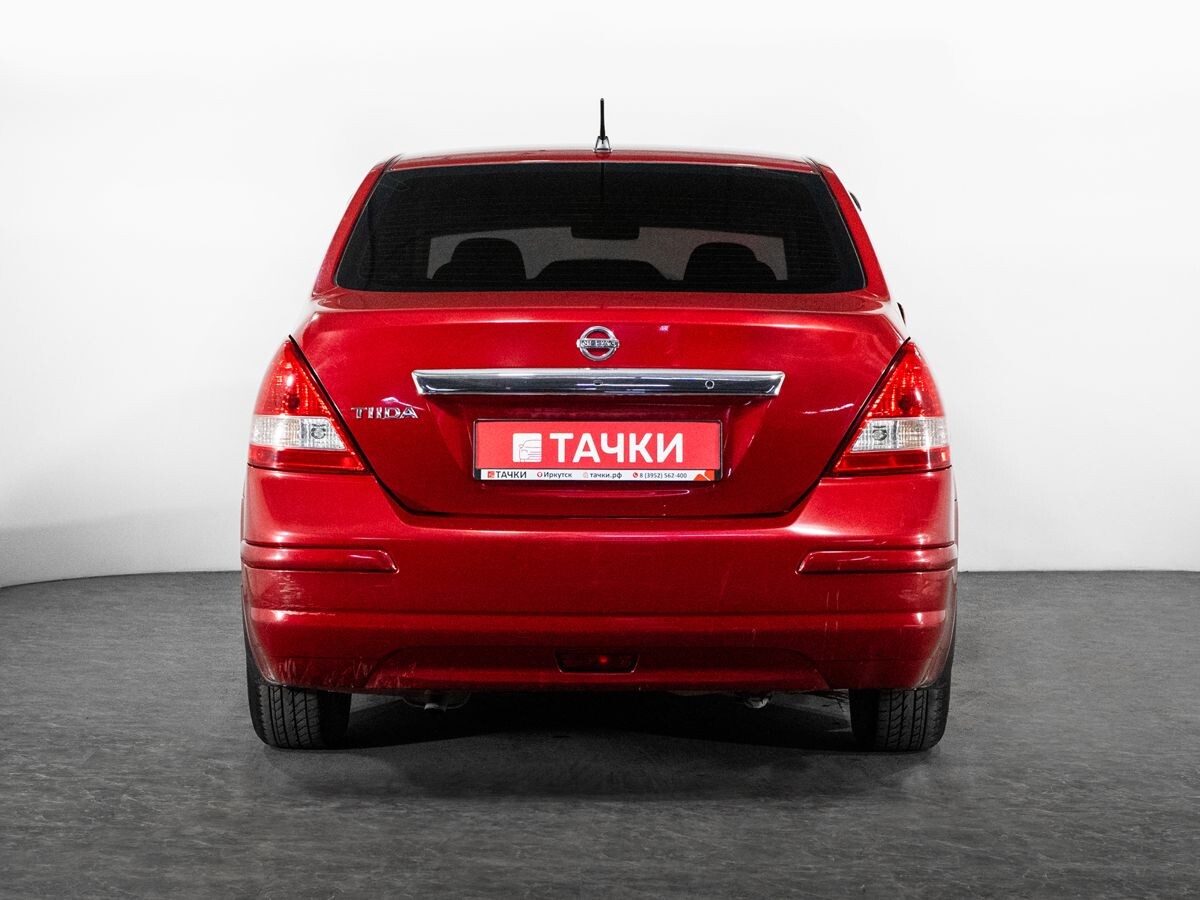 Nissan Tiida 2010 - фото автомобиля