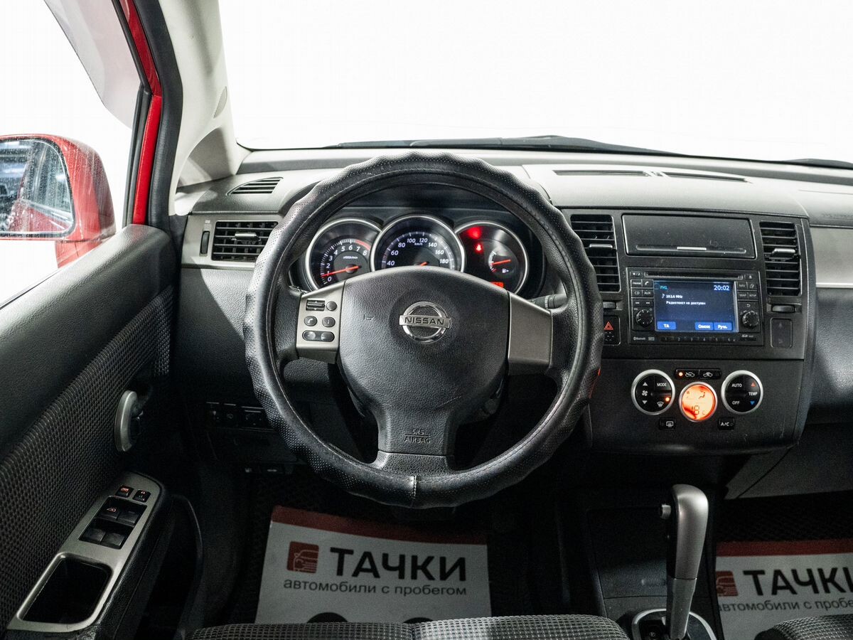 Nissan Tiida 2010 - фото автомобиля