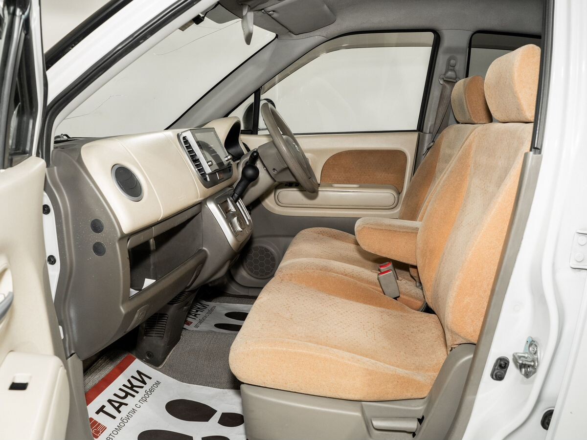 Nissan Moco 2010 - фото автомобиля