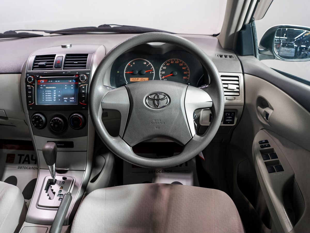 Toyota Corolla Axio 2009 - фото автомобиля
