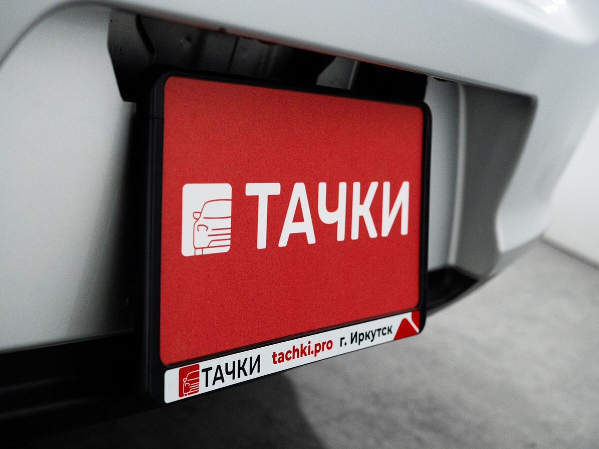 Nissan Tiida 2010 - фото автомобиля