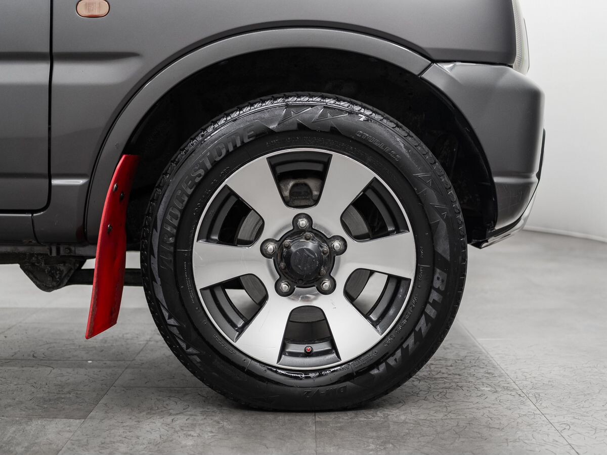 Suzuki Jimny 2010 - фото автомобиля