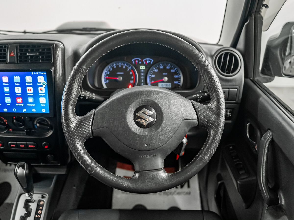 Suzuki Jimny 2010 - фото автомобиля
