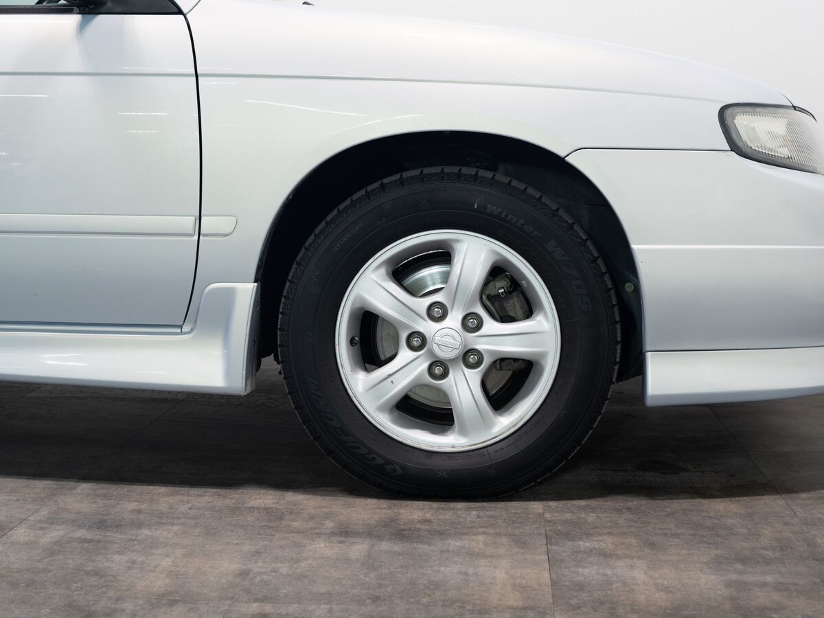 Nissan Avenir 2000 - фото автомобиля