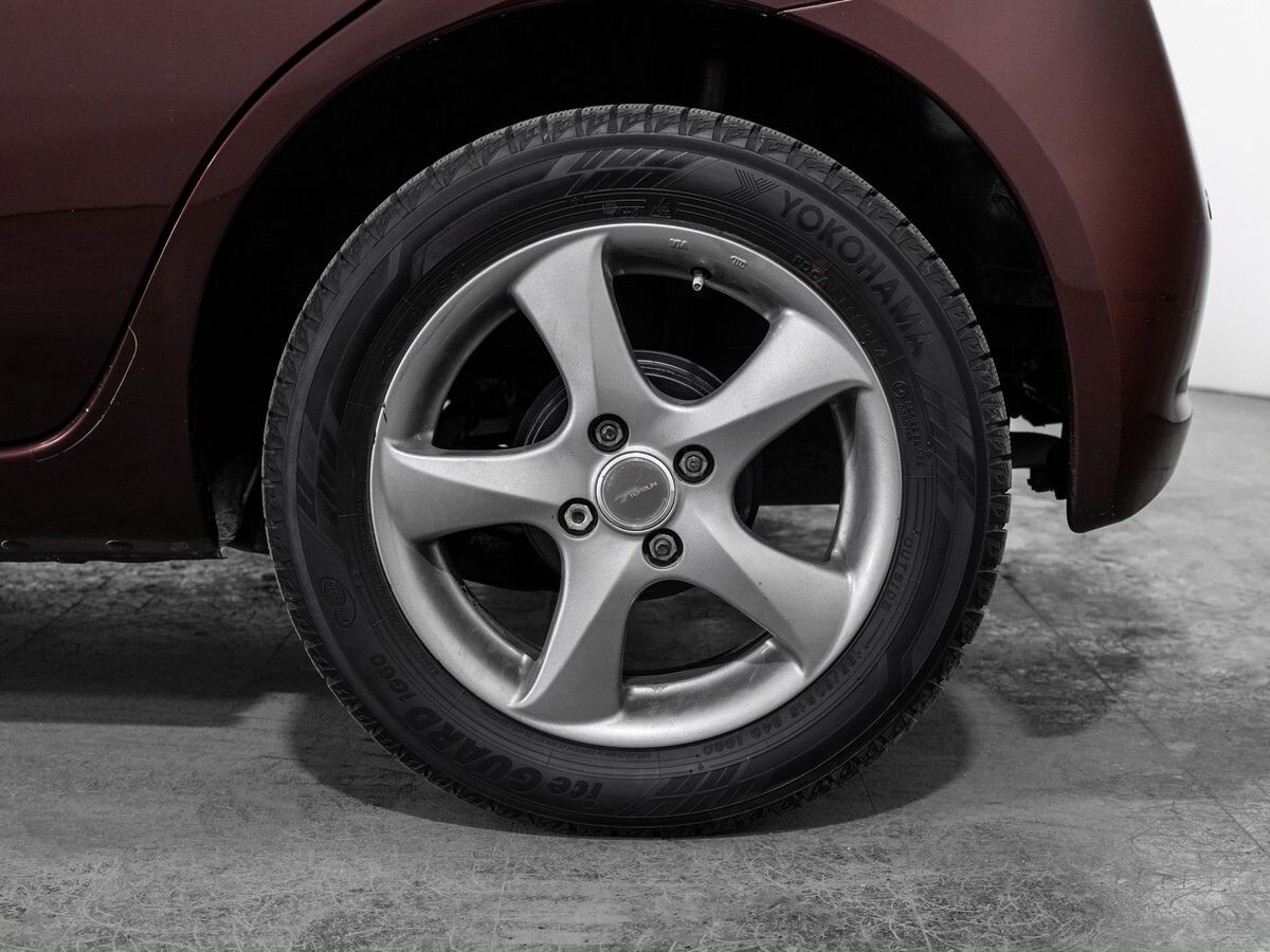 Nissan March 2010 - фото автомобиля